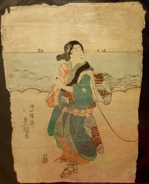 UTAGAWA TOYOKUNI (1769 - 1825). - Woman in a kimono at the seashore.
